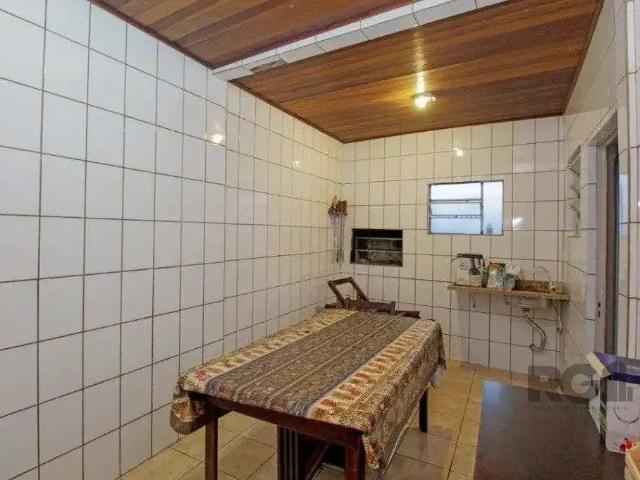 Casa / Sobrado para Venda em Porto Alegre/RS Rio Branco 4 Quartos