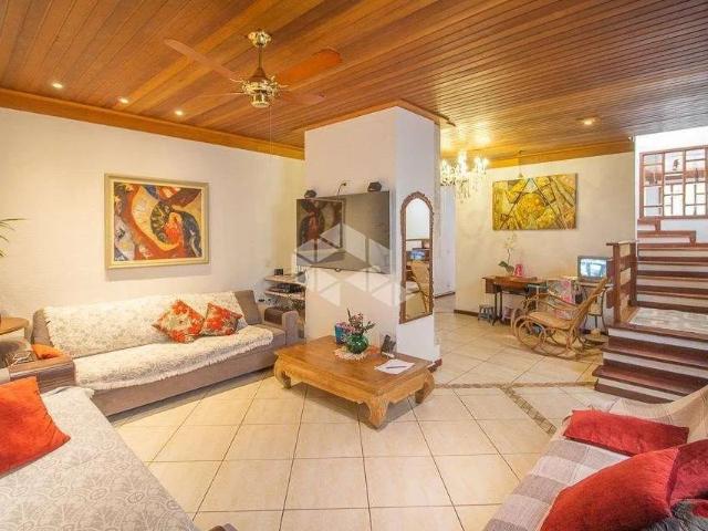 Casa / Sobrado para Venda em Porto Alegre/RS Rio Branco 4 Quartos