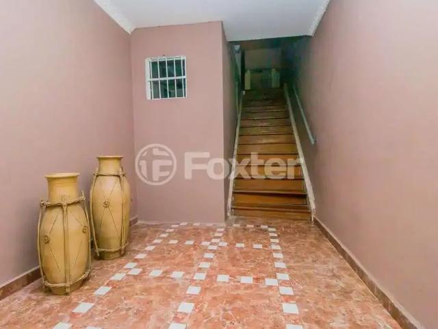 Casa / Sobrado para Venda em Porto Alegre/RS Rio Branco 4 Quartos