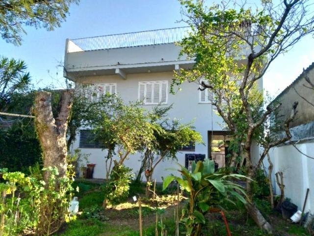 Casa / Sobrado para Venda em Porto Alegre/RS Rubem Berta 3 Quartos