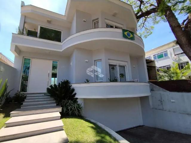 Casa / Sobrado para Venda em Porto Alegre/RS São Sebastião 4 Quartos