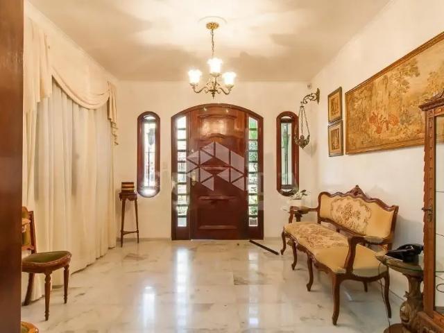 Casa / Sobrado para Venda em Porto Alegre/RS Santa Cecília 4 Quartos