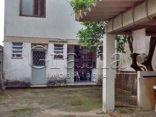 Casa / Sobrado para Venda em Porto Alegre/RS Santana 4 Quartos