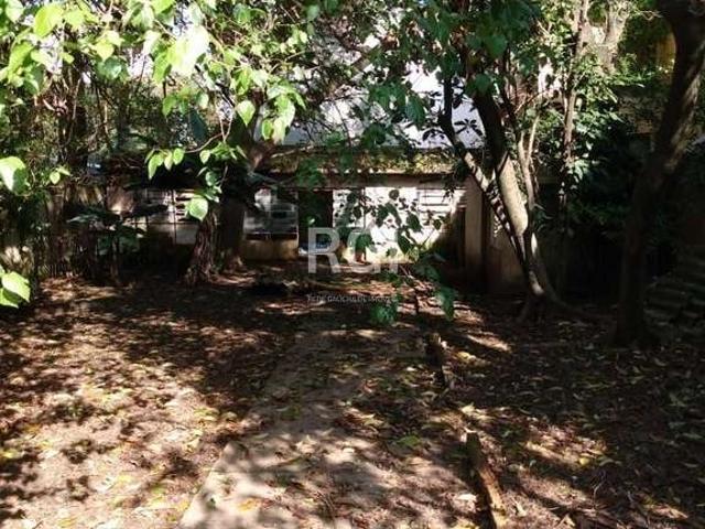 Casa / Sobrado para Venda em Porto Alegre/RS Santana 4 Quartos