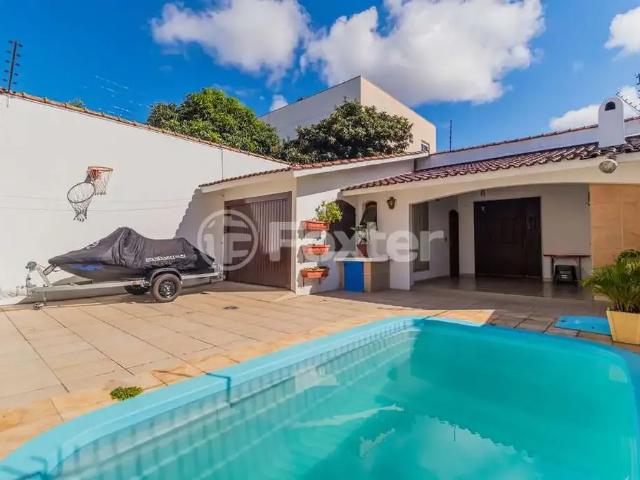 Casa / Sobrado para Venda em Porto Alegre/RS Santana 5 Quartos