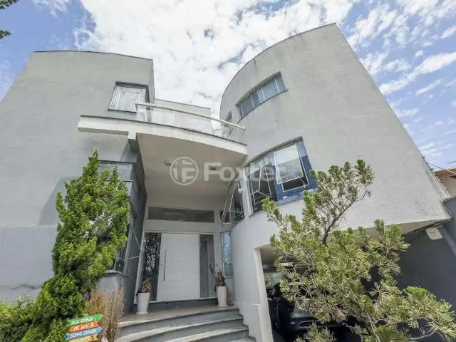 Casa / Sobrado para Venda em Porto Alegre/RS Santo Antônio 3 Quartos