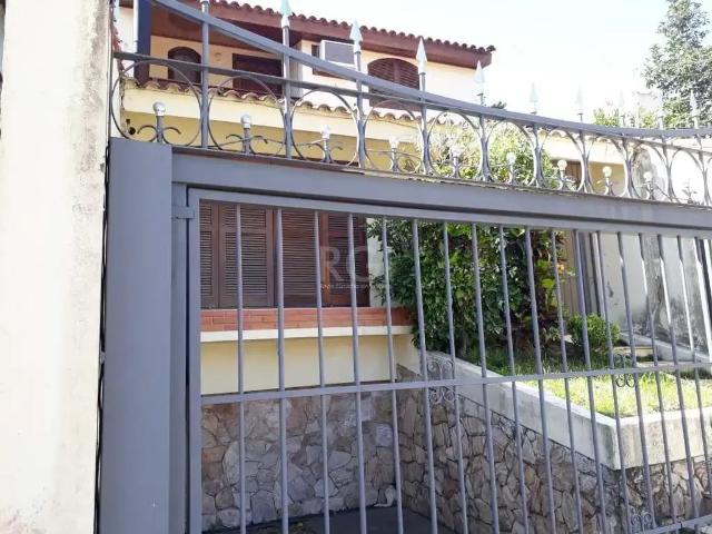 Casa / Sobrado para Venda em Porto Alegre/RS Santo Antônio 3 Quartos