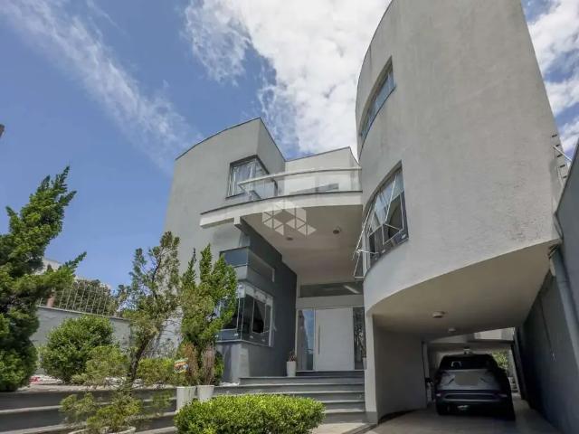 Casa / Sobrado para Venda em Porto Alegre/RS Santo Antônio 3 Quartos