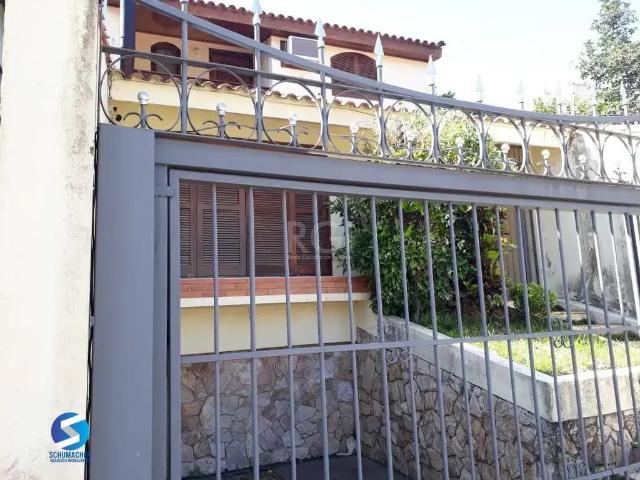 Casa / Sobrado para Venda em Porto Alegre/RS Santo Antônio 3 Quartos