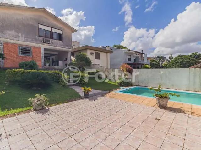 Casa / Sobrado para Venda em Porto Alegre/RS Santo Antônio 4 Quartos