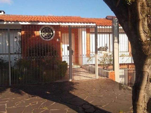 Casa / Sobrado para Venda em Porto Alegre/RS Santo Antônio 4 Quartos
