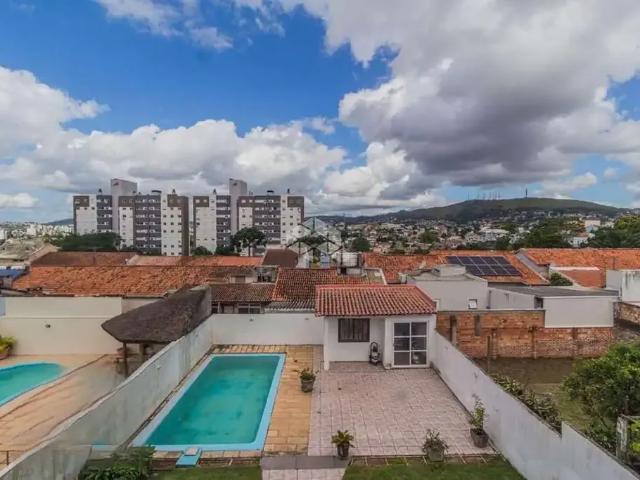 Casa / Sobrado para Venda em Porto Alegre/RS Santo Antônio 4 Quartos
