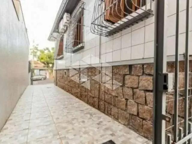 Casa / Sobrado para Venda em Porto Alegre/RS Santo Antônio 5 Quartos