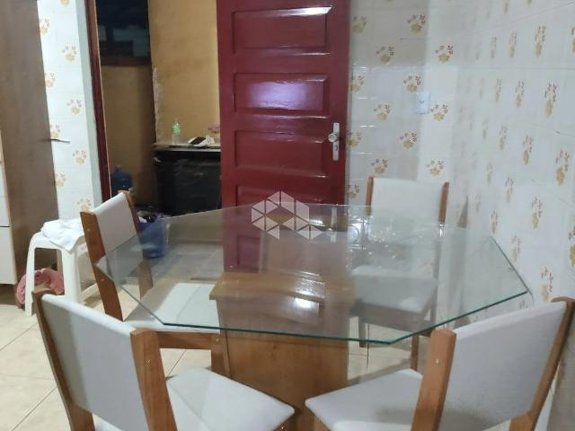 Casa / Sobrado para Venda em Porto Alegre/RS Sarandi 4 Quartos