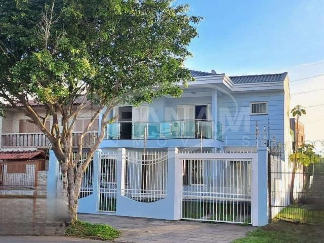 Casa / Sobrado para Venda em Porto Alegre/RS Sarandi 5 Quartos