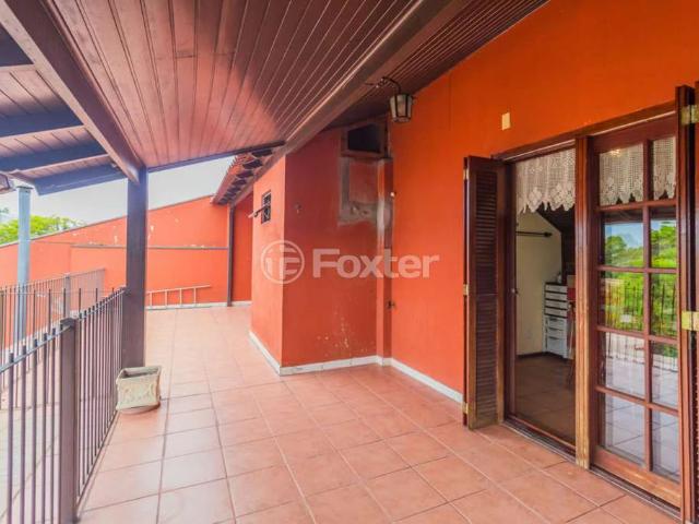 Casa / Sobrado para Venda em Porto Alegre/RS Serraria 4 Quartos