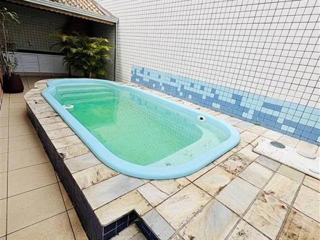 Casa / Sobrado para Venda em Praia Grande/SP Tupi 4 Quartos