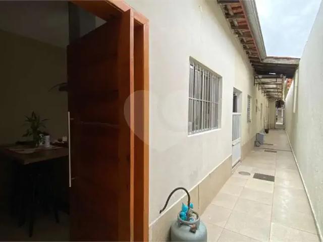 Casa / Sobrado para Venda em Praia Grande/SP Tupi 4 Quartos
