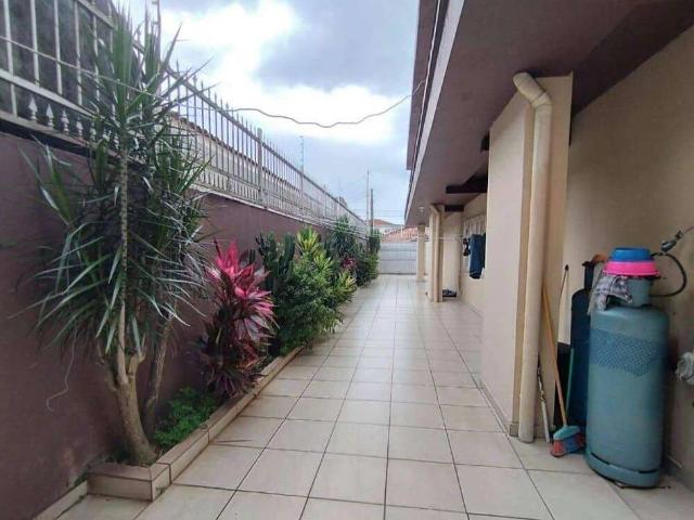 Casa / Sobrado para Venda em Praia Grande/SP Vila Mirim 4 Quartos