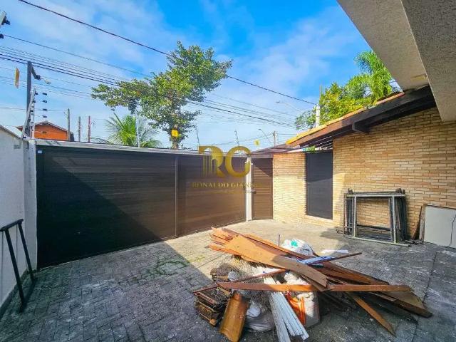 Casa / Sobrado para Venda em Praia Grande/SP Canto do Forte 4 Quartos