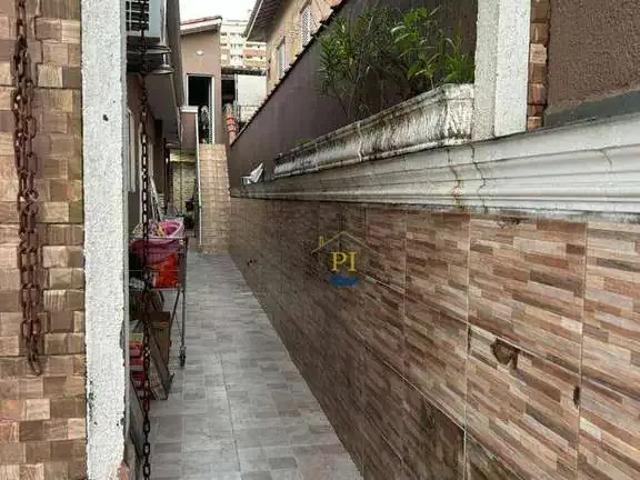 Casa / Sobrado para Venda em Praia Grande/SP Canto do Forte 4 Quartos