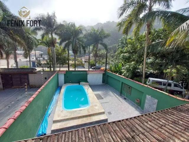 Casa / Sobrado para Venda em Praia Grande/SP Canto do Forte 4 Quartos