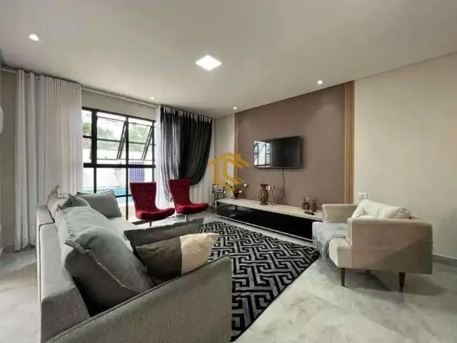 Casa / Sobrado para Venda em Praia Grande/SP Jardim Real 3 Quartos