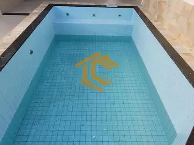 Casa / Sobrado para Venda em Praia Grande/SP Jardim Real 3 Quartos