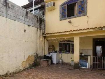 House à venda em Praça Delfos - Garagem