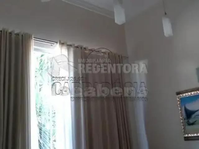 Casa / Sobrado para Venda em São José do Rio Preto/SP Parque Residencial Comendador Mançor Daud 4 Quartos