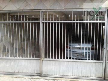 Casa à venda em Rua Protágoras - Garagem