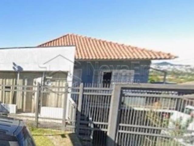 Casa / Sobrado para Venda em Santa Maria/RS Juscelino Kubitschek 3 Quartos
