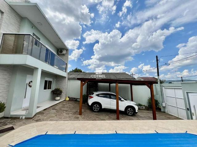 Casa / Sobrado para Venda em Santa Maria/RS Juscelino Kubitschek 3 Quartos