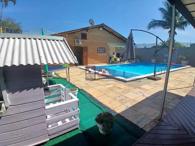 Casa / Sobrado para Locação em Caraguatatuba/SP Jardim Arua 3 Quartos
