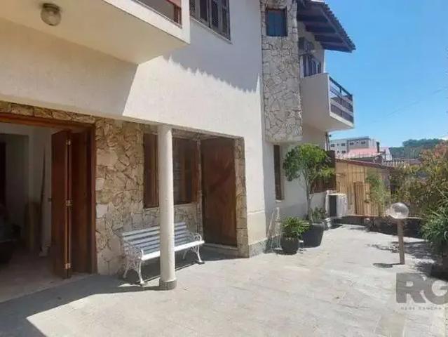 Casa / Sobrado para Locação em Porto Alegre/RS Cavalhada 4 Quartos