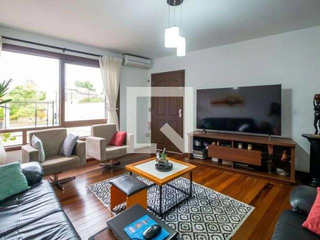 Casa / Sobrado para Locação em Porto Alegre/RS Campo Novo 4 Quartos