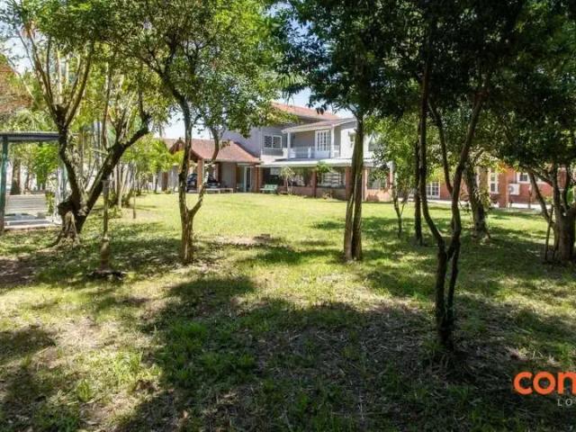 Casa / Sobrado para Locação em Porto Alegre/RS Guarujá 4 Quartos