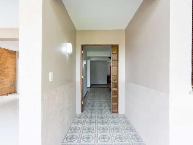 Casa / Sobrado para Locação em Porto Alegre/RS Guarujá 4 Quartos