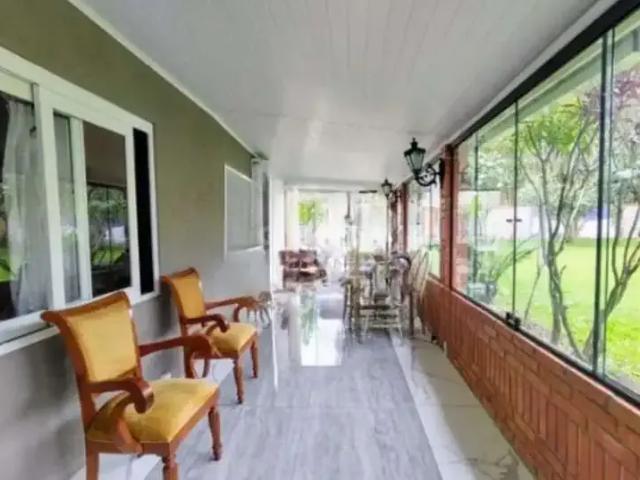 Casa / Sobrado para Locação em Porto Alegre/RS Guarujá 4 Quartos