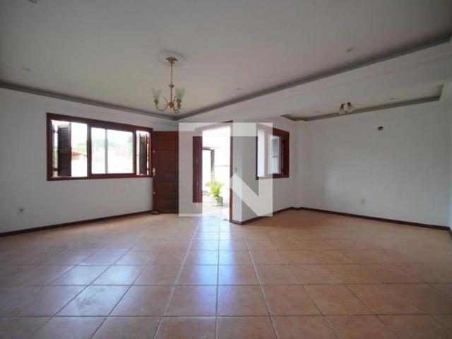 Casa / Sobrado para Locação em Porto Alegre/RS Guarujá 5 Quartos