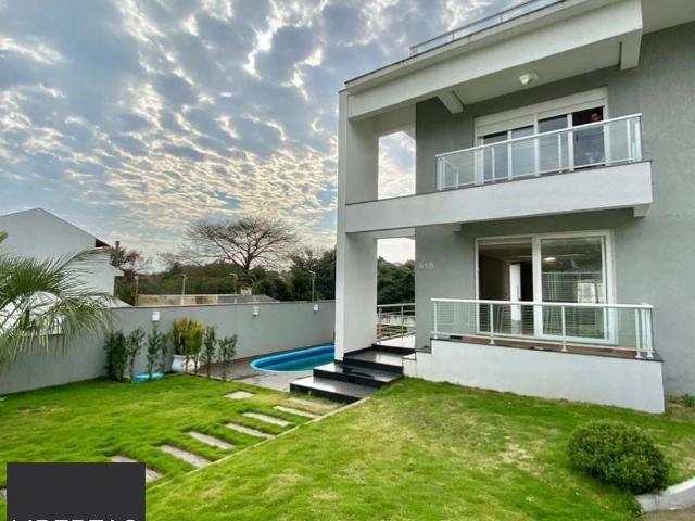 Casa / Sobrado para Locação em Porto Alegre/RS Espírito Santo 4 Quartos
