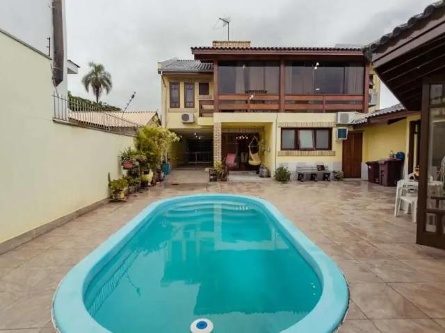 Casa / Sobrado para Locação em Porto Alegre/RS Jardim Lindóia 4 Quartos