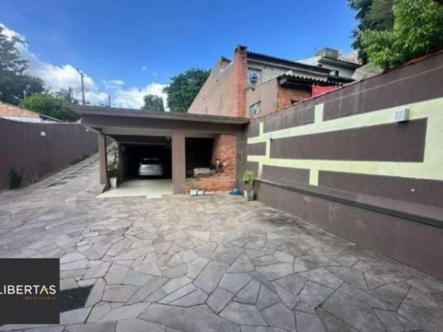 Casa / Sobrado para Locação em Porto Alegre/RS Jardim Lindóia 4 Quartos