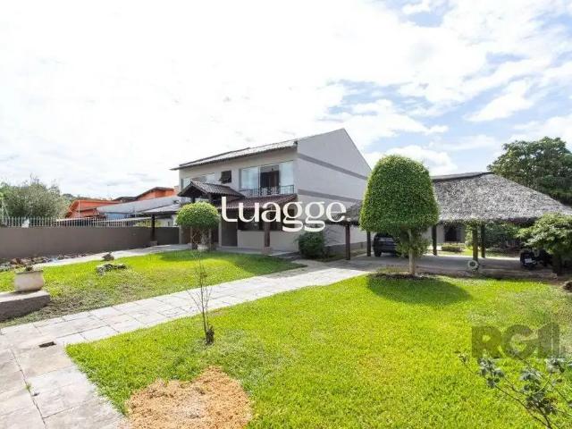 Casa / Sobrado para Locação em Porto Alegre/RS Serraria 4 Quartos