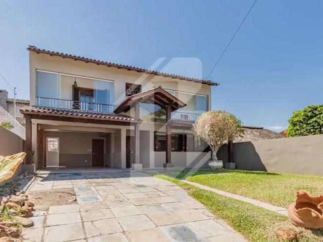 Casa / Sobrado para Locação em Porto Alegre/RS Serraria 4 Quartos