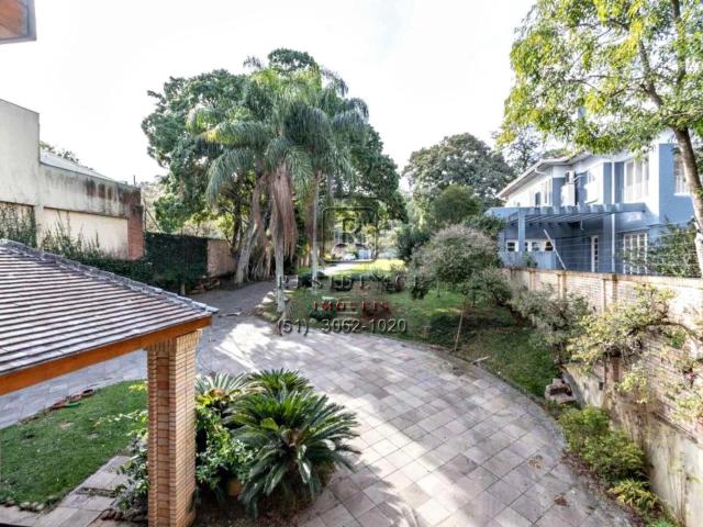 Casa / Sobrado para Locação em Porto Alegre/RS Pedra Redonda 4 Quartos