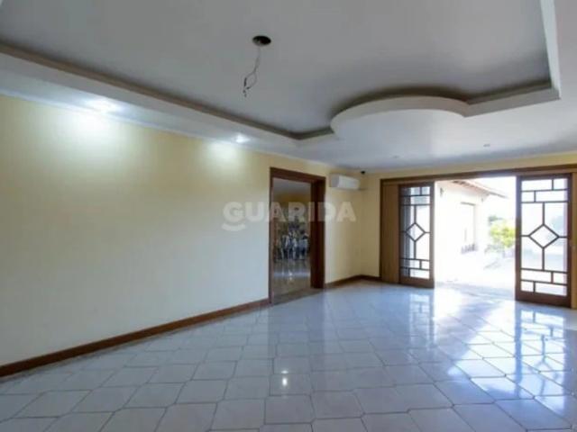 Casa / Sobrado para Locação em Porto Alegre/RS Vila Nova 4 Quartos