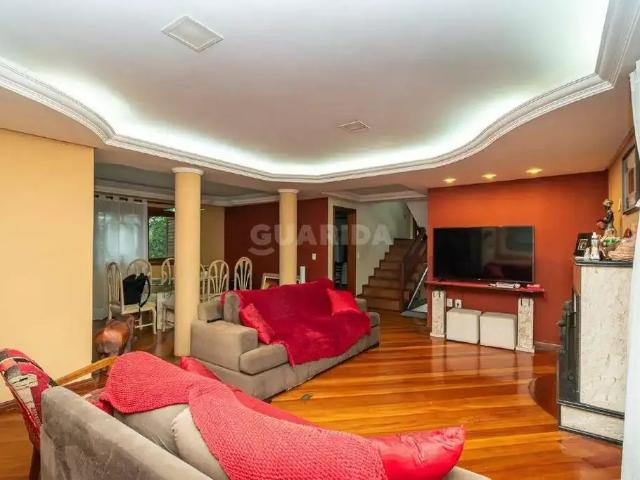 Casa / Sobrado para Locação em Porto Alegre/RS Vila Nova 5 Quartos