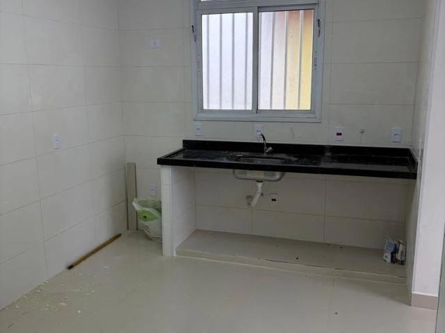 Casa / Sobrado para Locação em Praia Grande/SP Guilhermina 2 Quartos