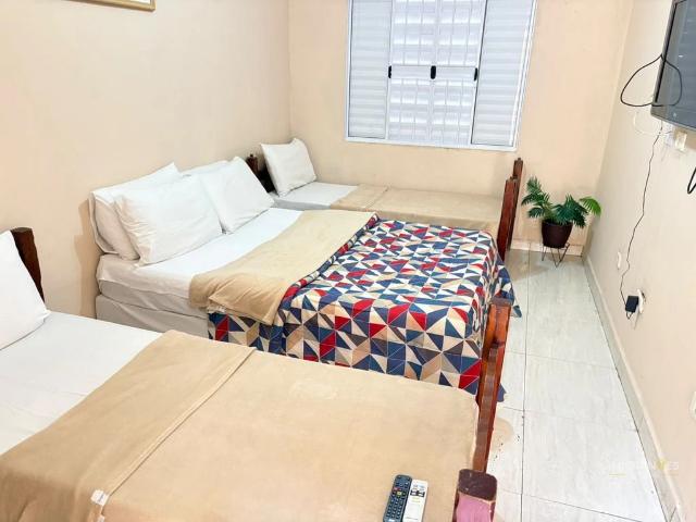 Casa / Sobrado para Locação em Praia Grande/SP Maracanã 9 Quartos